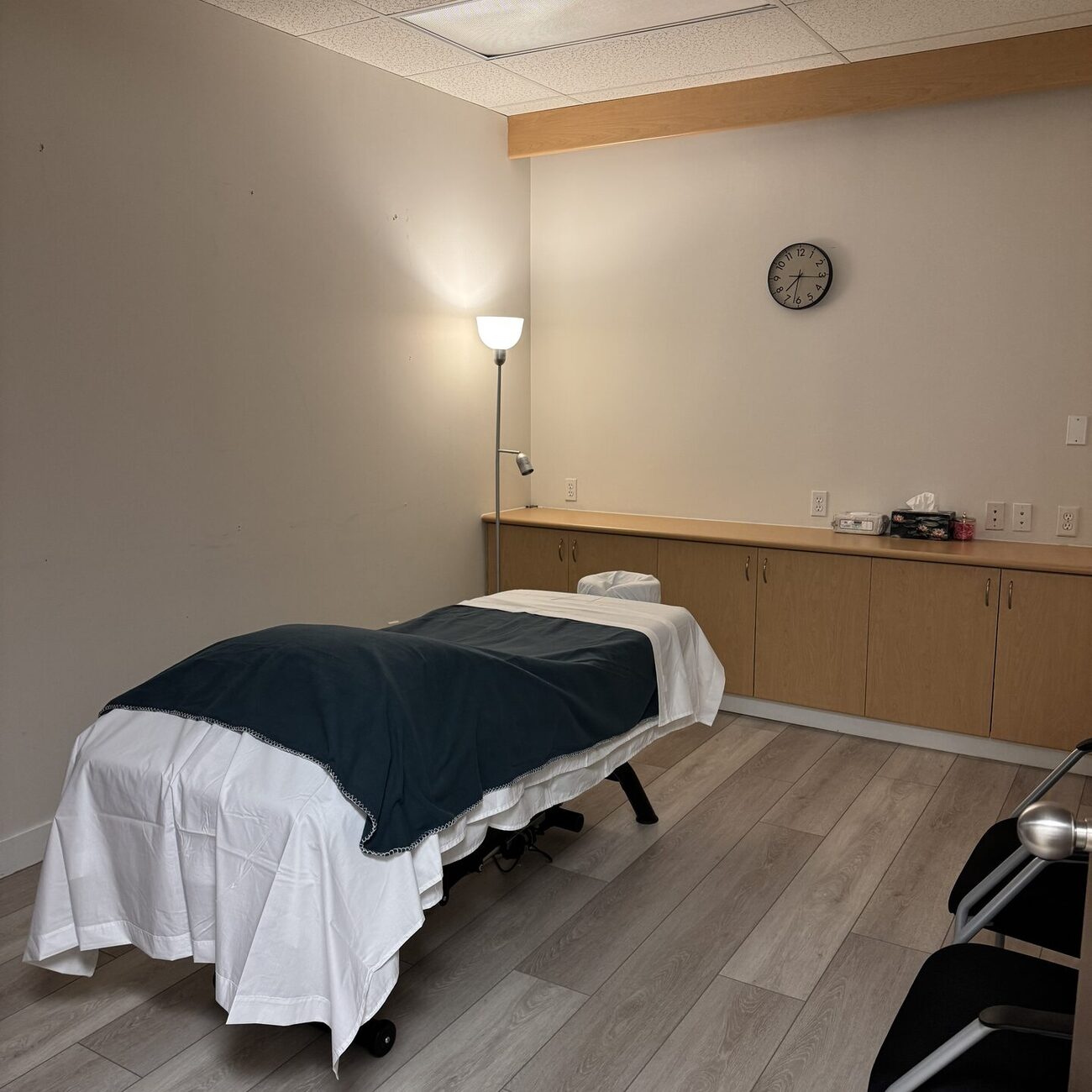 Clean, quiet RMT treatment room with fresh linens at Nova Restore Wellness in Burnaby
